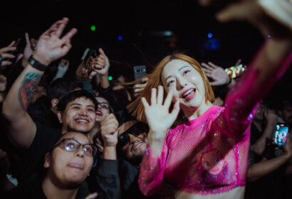 Picture of DJ SODA posing with attendee at Exchange LA in DTLA Nightclub