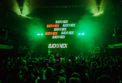 Black V Neck Support Photo for CID at Exchange LA Nightclub in DTLA